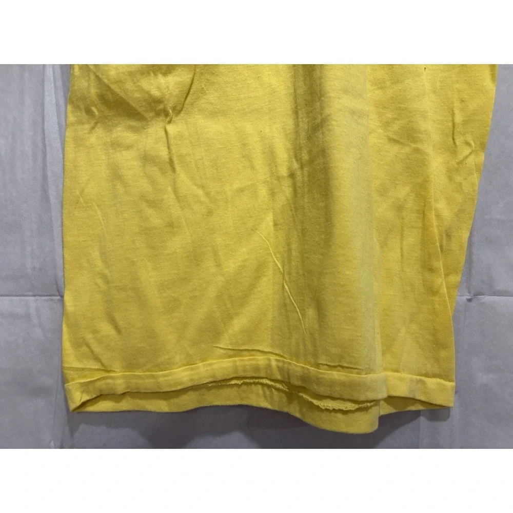 Vintage Yellow Tank Top with Black Trim and 'Macho Man' Graphic